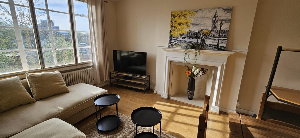 Bright, modern living room at Brondesbury Apartment in London, celebrating the launch of the new website on 27th April 2025.